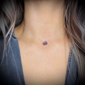 Handmade Fluorite necklace worn on model’s neck for size and style reference
